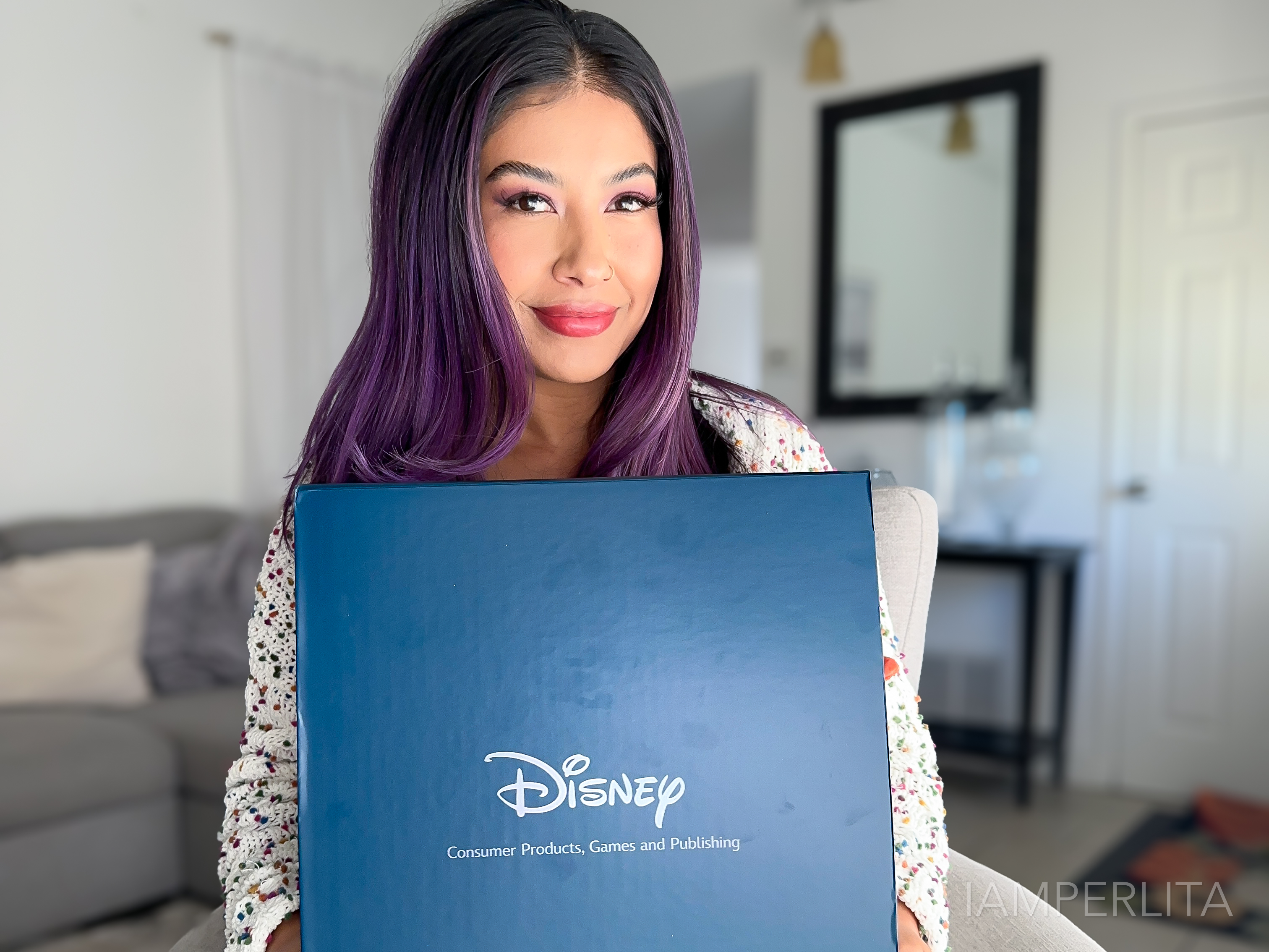 Perla holding Disney Gift Guide PR Guide