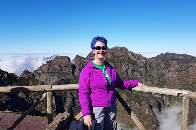 Posing above the clouds at the top