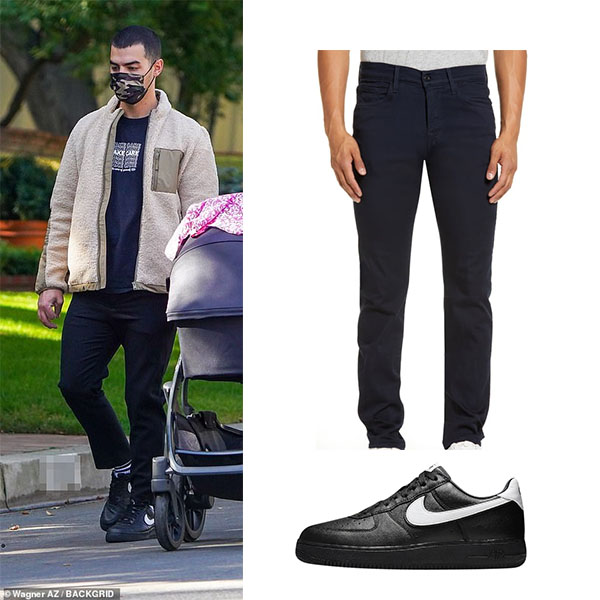 Joe Jonas in black pants and black sneakers in Los Angeles