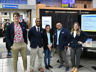 Dan Hooten (pictured second to left) standing with four other Career Services staff members at the 2020 Job Fair.