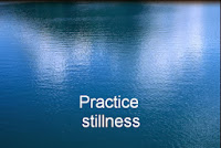 Intention #13 - Practice Stillness to Find More Peace - picture of still lake