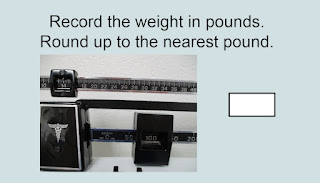 Record the weight in pounds. Round up to the nearest pound. Arrows are at 100 and 14.