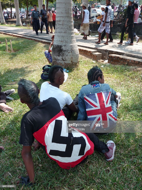 Rebellious Black kids, one is sporting a swastika. #PMRC PunkMetalRap.com