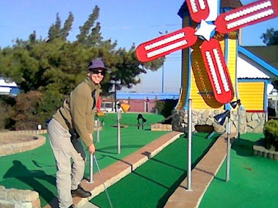 Leaping Woman playing miniature golf