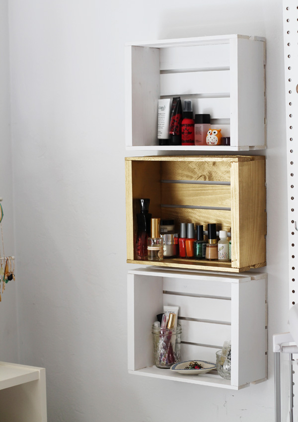 filled each shelf with makeup, perfumes, lip glosses, nail polishes 