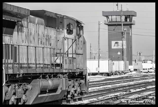 UP 9513 leads a train north toward the Dupo Yard tower. 