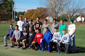 the top 16 varsity boys (place 16 -9 in front row, left to right, 8 - 1 in back row, right to left)