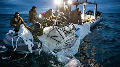 U.S. Navy releases first photos of Chinese balloon recovery, China asks US to return debris