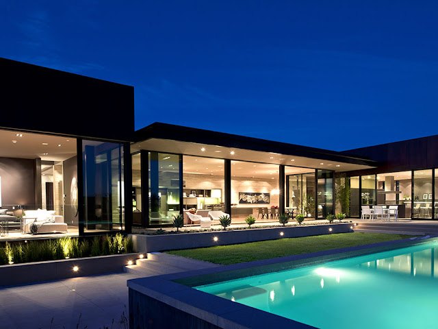 Photo of the backyard of luxury modern Hollywood house as seen at sunset