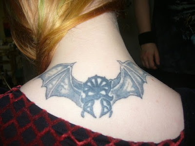 picture of bat tattoo design on upperback tattoos