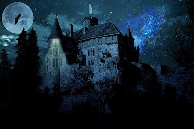 Haunted castle under the cover of a full moon