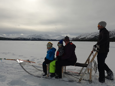 Family on a dog sled, Sky High Wilderness Ranch