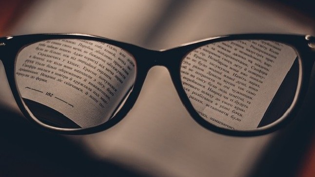 Spectacle on a book