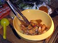 Toss baked wings with chili sauce