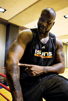 Shaquille O'Neal Dog Tattoos