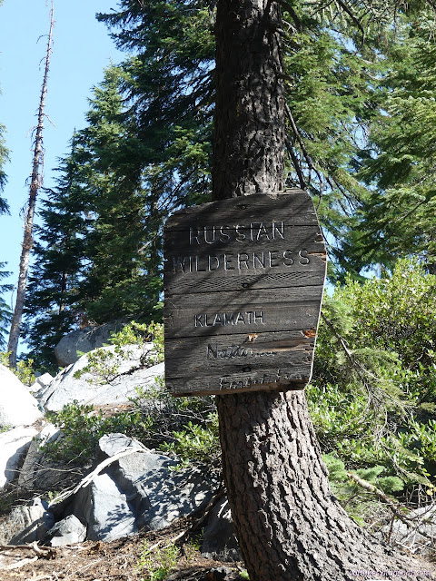 075: wooden sign saying Russian Wilderness