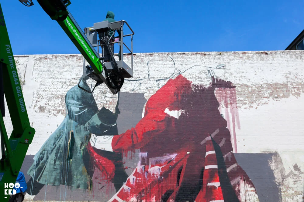 Irish artist Conor Harrington at work on his Walthamstow Street Art Mural