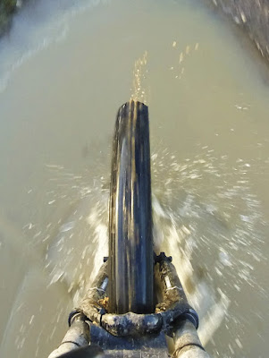 Cycling through an icy puddle