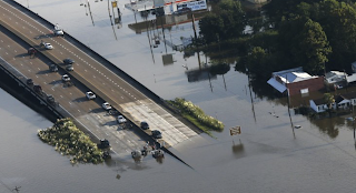  Rescuers seek anyone _ alive or dead _ left in floodwaters