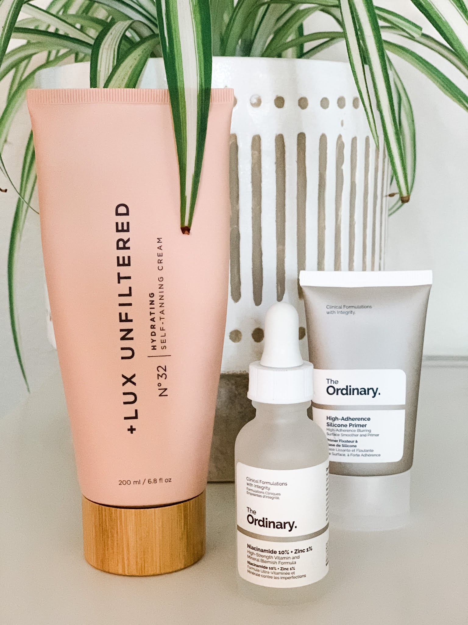 Lux Unfiltered self-tanner and The Ordinary products