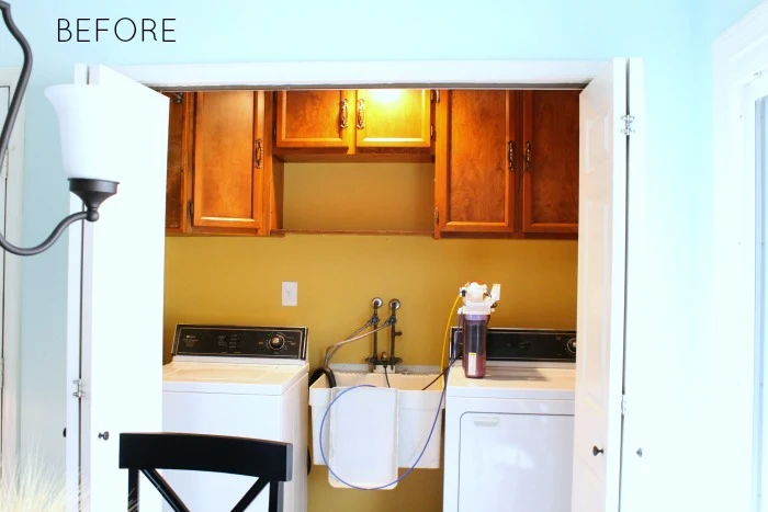 This laundry room got a beautiful makeover! Great before and after!