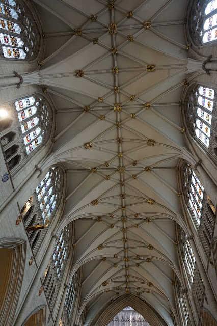 The South Transept of York Mintser with the guilded ceiling, stained windows and high ceilings