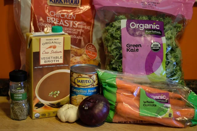 The ingredients needed to make the Crockpot Chicken and Kale Soup.