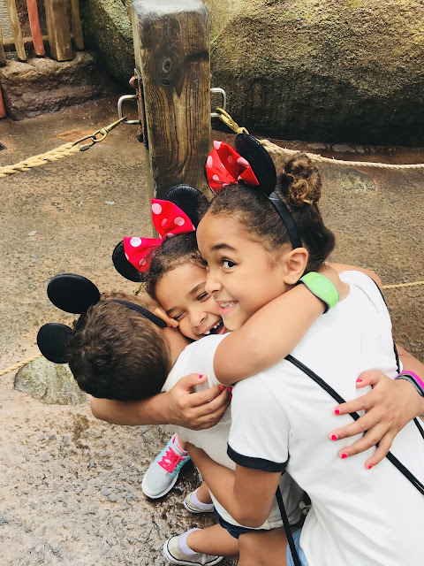 Kids hugging at Walt Disney World