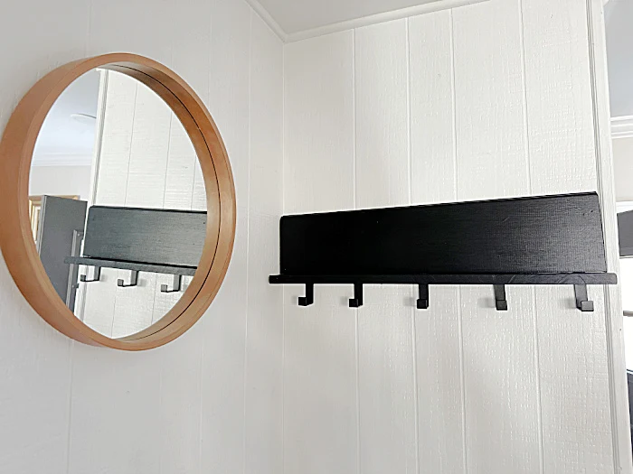 black hook rack shelf and mirror