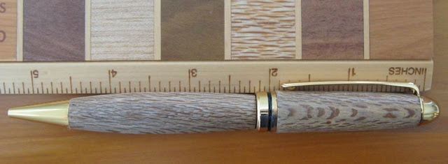 wooden ruler and pen