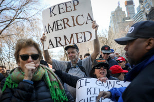 White men armed with guns and sidearms counter protesters during #MarchForOurLives rallies at different locations across the country. They dubbed theirs #MarchForOurGuns. Some shouting "March For Our Guns" into cameras.  Oddly, there presence since to come and go without violence besides the chants from both faction.  See more 'brazen' photos after the cut