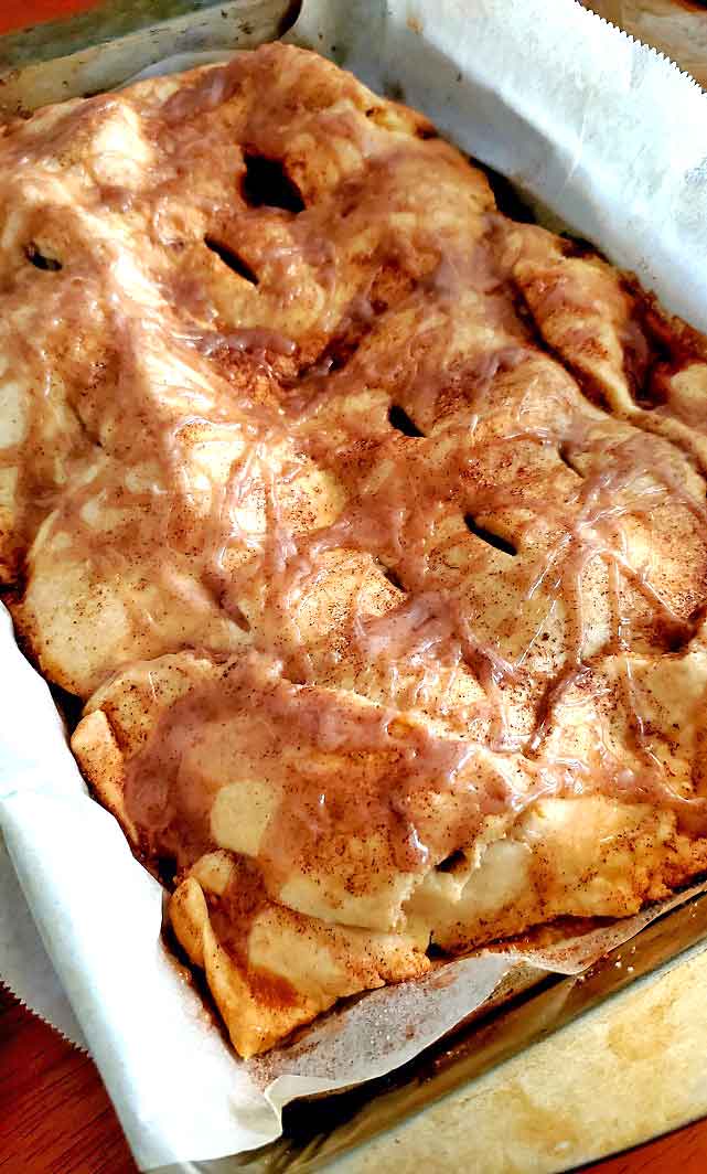 this is a sheet  pan apple filled slab pie