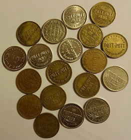 A selection of Putt-Putt tokens from the Museum's vaults