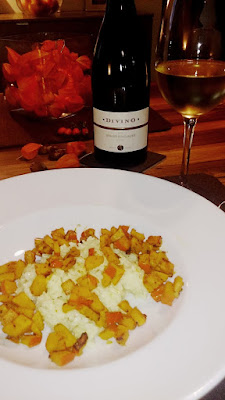 A plate with risotto and squash paired with a Pinot Gris of Franconia