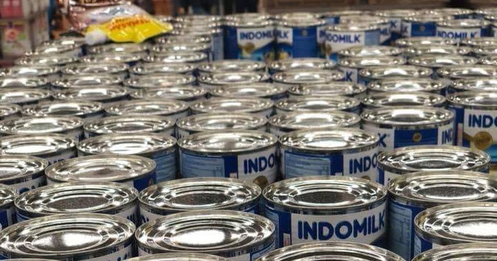 INDONESIA TERTIPU OLEH SUSU  KALENG  KENTAL MANIS CAP  