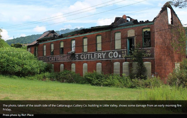 Fire damage to roof, exterior facade still standing, Cattaraugus Cutlery after August 2015 fire