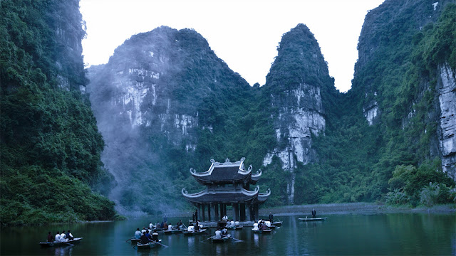 A temple in the middle of a lagoon.