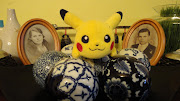 Meet my Pikachu doll (bought from my Japan trip at a misc store for a .