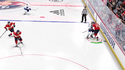 Thrilling gameplay in NHL 24 with players vying for puck possession.