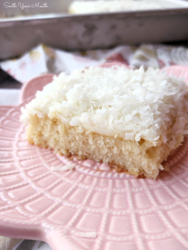 Coconut Texas Sheet Cake! A velvety tender sheet cake recipe made with coconut milk for a super moist texture and tons of coconut flavor.