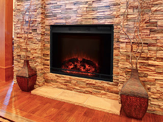The Edgeline Electric Fireplace firebox insert is designed to fit into an existing mantel or recessed wall.