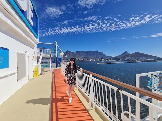 Me standing on NCL Jade deck, table mountain in background