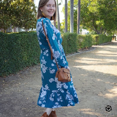 awayfromtheblue Instagram | Kmart teal floral midi dress with tan accessories spring church outfit