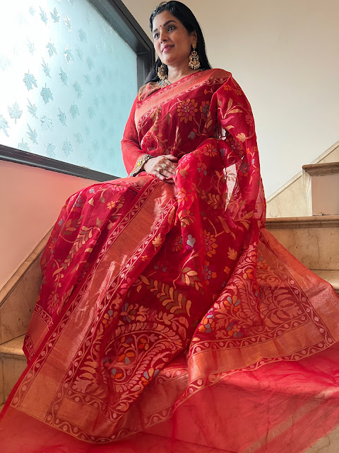 Raktambari- red cotton jamdani with koniyas saree