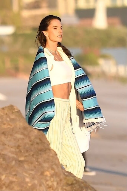 Alessandra Ambrosio poses during a beach photoshoot in Malibu