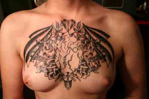 upper chest writing tattoo