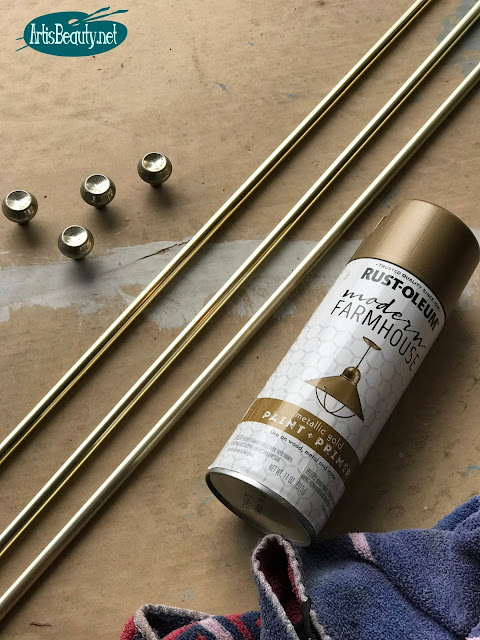 farmhouse gold spray paint by rustoleum for making over hardware on a mcm dresser