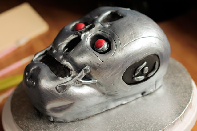 Hand carved Terminator T800 Skull Birthday Cake, step by step photographic instructions at my blog  www.goodfoodshared.blogspot.com