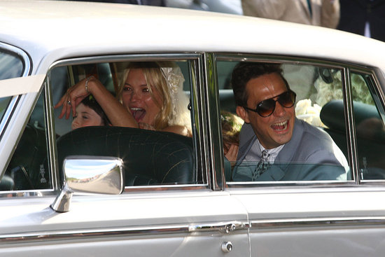 Kate Moss heading into her wedding in a silver Rolls Royce wearing John 