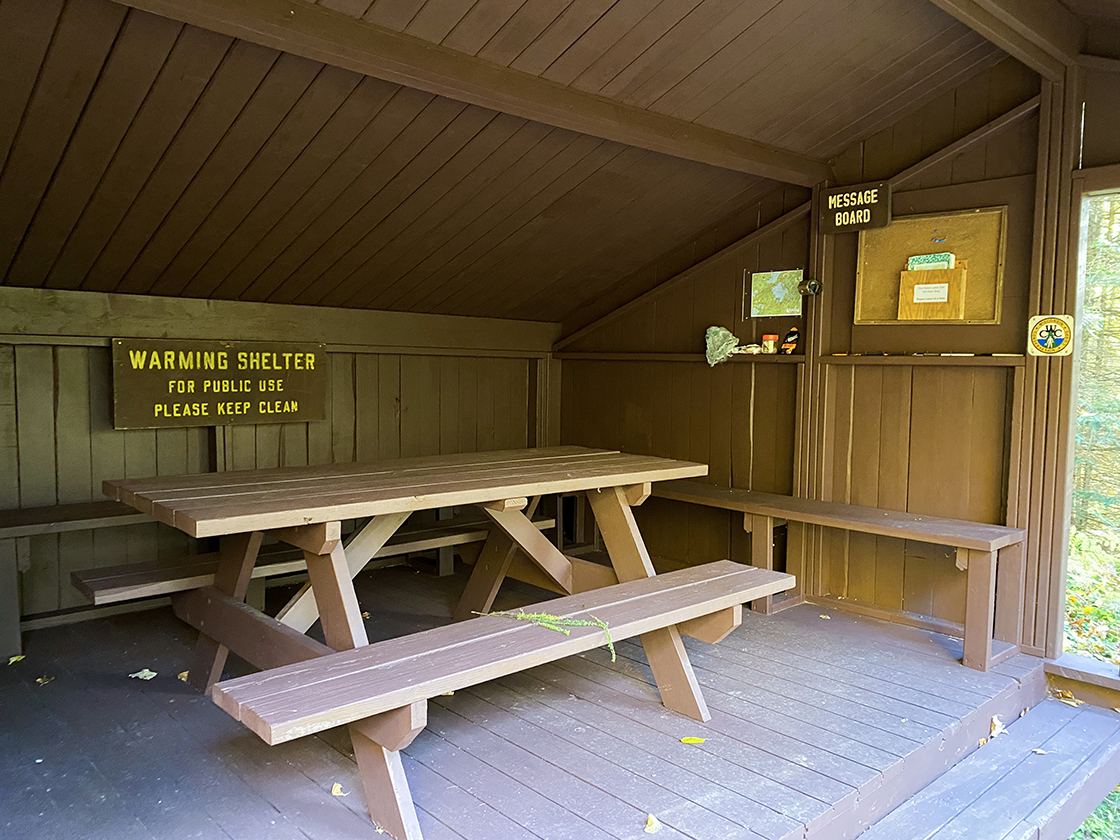 Brown painted slant roof shelter